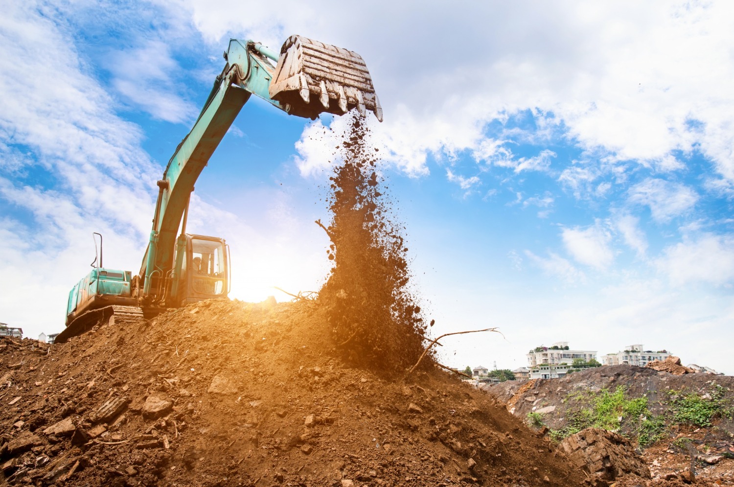 Excavator on a Charles Brown job site